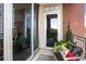 Private balcony with outdoor seating and potted plants at 1820 Peachtree Nw St # 607, Atlanta, GA 30309