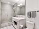 Clean bathroom with a walk-in shower and modern vanity at 1820 Peachtree Nw St # 607, Atlanta, GA 30309