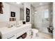 Contemporary bathroom with a walk-in shower and white vanity at 1820 Peachtree Nw St # 607, Atlanta, GA 30309