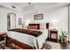 Bright bedroom with hardwood floors, a ceiling fan, and large windows at 1820 Peachtree Nw St # 607, Atlanta, GA 30309