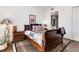 Spacious bedroom with a wooden sleigh bed and stylish decor at 1820 Peachtree Nw St # 607, Atlanta, GA 30309