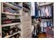 Large walk-in closet with ample shelving and hanging space at 1820 Peachtree Nw St # 607, Atlanta, GA 30309