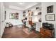 Bright home office with built-in shelving and hardwood floors at 1820 Peachtree Nw St # 607, Atlanta, GA 30309