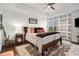 Spacious main bedroom with hardwood floors and a ceiling fan at 1820 Peachtree Nw St # 607, Atlanta, GA 30309