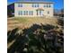 Wide backyard with a fire pit and a clear view of the home's rear exterior at 3026 Bridge Walk Dr, Lawrenceville, GA 30044