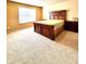 Spacious bedroom with carpeted floor and large window at 3026 Bridge Walk Dr, Lawrenceville, GA 30044