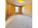 Bright bedroom with carpeted floors and a window at 3026 Bridge Walk Dr, Lawrenceville, GA 30044