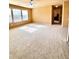 Spacious main bedroom with carpeted floor and large windows at 3026 Bridge Walk Dr, Lawrenceville, GA 30044