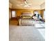 Main bedroom with a king-size bed and neutral color palette at 3026 Bridge Walk Dr, Lawrenceville, GA 30044