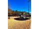 Community playground with playset and safe surface at 3026 Bridge Walk Dr, Lawrenceville, GA 30044