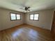 Bright bedroom with hardwood floors and ample natural light at 5670 Lanny Dr, Powder Springs, GA 30127