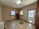 Mudroom with tile floors and exterior access at 5670 Lanny Dr, Powder Springs, GA 30127