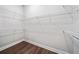 This is a new closet with wire shelving and hardwood floors at 1026 Cagle Creek Overlook, Canton, GA 30115