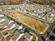 Aerial view of a large neighborhood with many houses at 1026 Cagle Creek Overlook, Canton, GA 30115