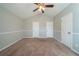 Spacious bedroom with neutral wall paint and carpet at 540 Lakecourt Dr, Mcdonough, GA 30253