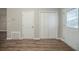 Front entry with wood-look flooring and closet at 540 Lakecourt Dr, Mcdonough, GA 30253