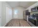 Modern kitchen with stainless steel appliances and granite countertops at 540 Lakecourt Dr, Mcdonough, GA 30253