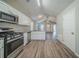 Modern kitchen with stainless steel appliances and granite countertops at 540 Lakecourt Dr, Mcdonough, GA 30253