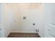 Laundry closet with hookups and wire shelving at 540 Lakecourt Dr, Mcdonough, GA 30253
