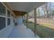 The home's back patio offers views of the trees in the backyard at 1202 Ida Woods Ln, Lawrenceville, GA 30045