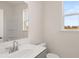 Clean bathroom with single vanity and shower at 13550 Whitman Se Ln, Covington, GA 30014