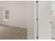 Bright bathroom with a tub and natural light at 13550 Whitman Se Ln, Covington, GA 30014