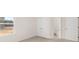Spacious bedroom with double doors to closet and view at 13550 Whitman Se Ln, Covington, GA 30014