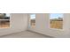 Bright bedroom with three windows and view at 13550 Whitman Se Ln, Covington, GA 30014
