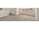 Spacious bedroom with neutral carpeting and natural light at 13550 Whitman Se Ln, Covington, GA 30014