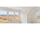 Bright bedroom with large windows and view at 13550 Whitman Se Ln, Covington, GA 30014