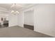 Dining room with chandelier and access to kitchen at 13550 Whitman Se Ln, Covington, GA 30014