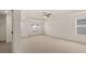 Spacious main bedroom with ceiling fan and large windows at 13550 Whitman Se Ln, Covington, GA 30014