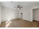 Spacious bedroom with ensuite bathroom access and wood-look floors at 164 Chicamauga Sw Ave, Atlanta, GA 30314