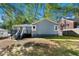 Backyard view of a charming blue house with a deck at 164 Chicamauga Sw Ave, Atlanta, GA 30314