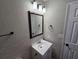 Bathroom with vanity, mirror and towel rack at 1037 Forest Path, Stone Mountain, GA 30088