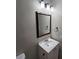 Simple bathroom with vanity and updated lighting at 1037 Forest Path, Stone Mountain, GA 30088