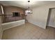 Dining room with tile floor and view of living room at 1037 Forest Path, Stone Mountain, GA 30088