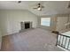 Living room with fireplace and neutral carpeting at 1037 Forest Path, Stone Mountain, GA 30088