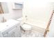 Small bathroom with gray vanity, toilet and shower/tub combo at 2832 Fieldstone Se Dr, Conyers, GA 30013