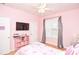 Bright bedroom with a TV and plenty of storage at 2832 Fieldstone Se Dr, Conyers, GA 30013