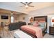 Basement bedroom with a sitting area and a ceiling fan at 2832 Fieldstone Se Dr, Conyers, GA 30013