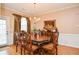 Elegant dining room with hardwood floors and a chandelier at 2832 Fieldstone Se Dr, Conyers, GA 30013