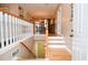 Elegant wooden staircase with white spindles and hardwood floors at 2832 Fieldstone Se Dr, Conyers, GA 30013