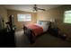 Spacious bedroom with a king-size bed and window at 4198 Wellington Hills Ln, Snellville, GA 30039