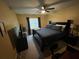 Large bedroom with a king-size bed and TV at 4198 Wellington Hills Ln, Snellville, GA 30039