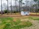 Large backyard features a storage shed and a newly installed fence at 467 Concord Sw Rd, Smyrna, GA 30082