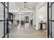 Bright foyer with hardwood floors and a view into the living room and dining areas at 467 Concord Sw Rd, Smyrna, GA 30082