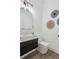 Stylish powder room with square sink, modern lighting, and decorative wall art at 467 Concord Sw Rd, Smyrna, GA 30082