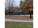 Outdoor basketball court with fall leaves at 1604 Pine Tree Trl, Atlanta, GA 30349