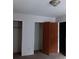 Simple bedroom with two closets and neutral walls at 1604 Pine Tree Trl, Atlanta, GA 30349